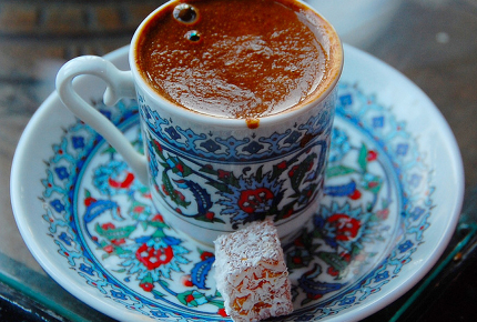 A Turkish coffee with a cube of Turkish delight