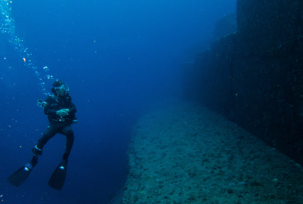 A diver weighs up the Yonaguni Monument