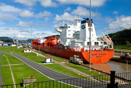 A ship makes its way through a Panama Canal lock