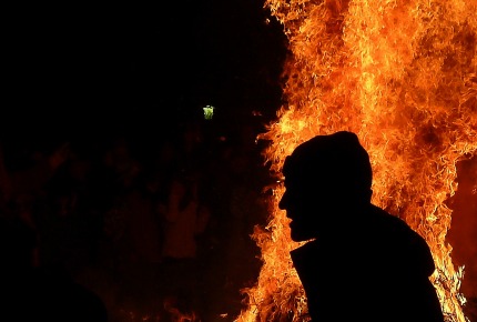 Fire-jumping at Novruz Festival is said to burn away any lingering woes