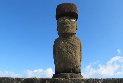 Giant Moai beneath the blue sky.