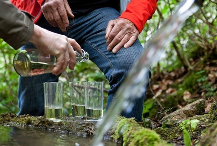 Hikers mix Absinthe with spring water