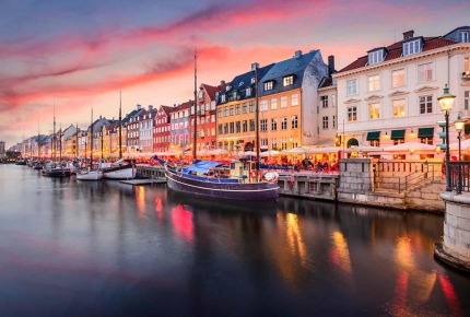 Nyhavn is the picture-perfect 7th-century waterfront in Copenhagen, Denmark
