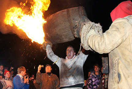 See a small town in Devon go wild during the annual Flaming Tar Barrel Procession