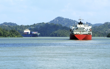 Ships scythe through Panama's man made Gutan Lake