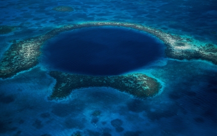 The Great Blue Hole is a feature of the Belize Barrier Reef
