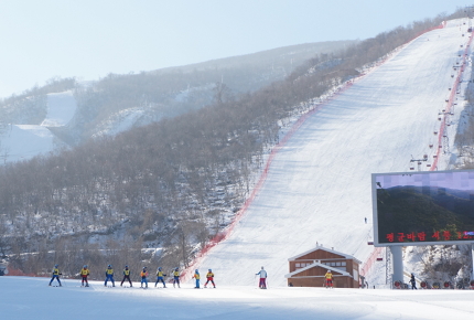 The resort's slopes are lined with propaganda spewing screens