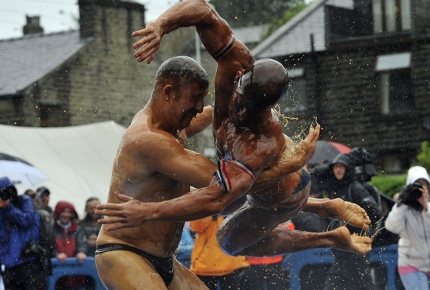 Two men rally up the crowds for the World Gravy Wrestling Championship