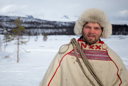 Herder Nils Aslak Oskal in his traditional poncho