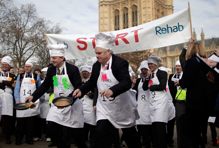 Locals toss up some pancakes for the annual Pancake Race