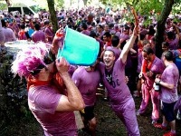 Revellers are dyed purple at the Batalla del Vino