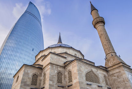 The Turkish Mosque stands in the Flame Towers' shadow