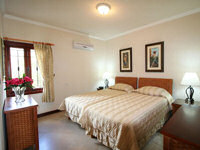Rooms are comfortable at the Sugar Cane Club Hotel