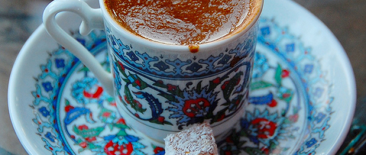 A Turkish coffee with a cube of Turkish delight