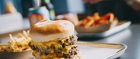 Bunsen's relish-drenched, chunky patties are unapologetically messy