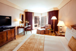 The rooms have a contemporary feel and views of the bustling city below