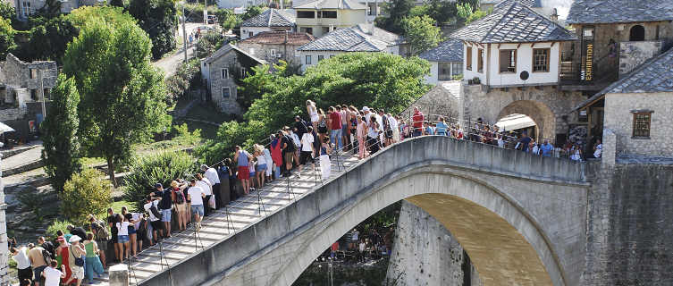 Divers off of the Stari Most in Mostar