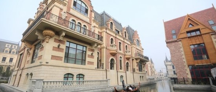 Enjoy a peaceful gondola ride down the Dalian canal.