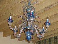 Examine exquisite Murano glass chandeliers at the Boscolo Hotel Dei Dogi in Venice.