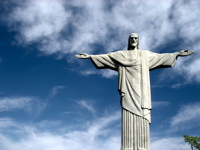 Gawp at stunning Rio city views from beneath the outspread arms of the statue of Christ the Reedeemer