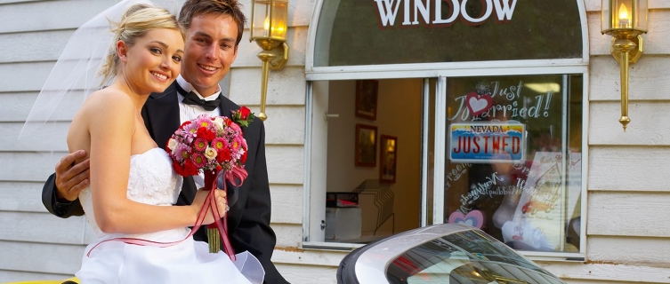 Newlyweds at this drive-up wedding chapel. 