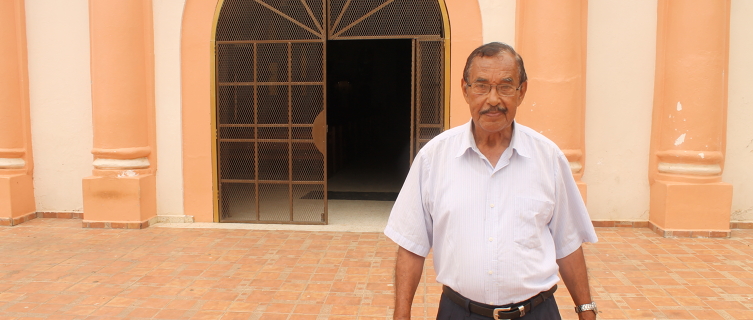 Professor Hector Rodas stands outside Yoro's church