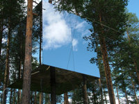 Hide in the mirror cube tree house in Sweden