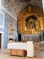 Colourful tiles adorn the walls of the still-used chapel