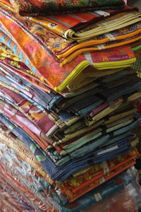 Peruse the fabrics at Makola market 