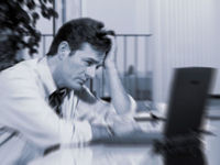 Depressed office worker © www.123rf.com