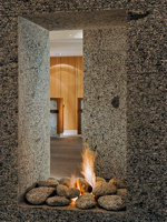 Granite fireplace by the reception © Best Western Premier Le Morgane