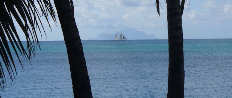 Saba island with yacht in foreground