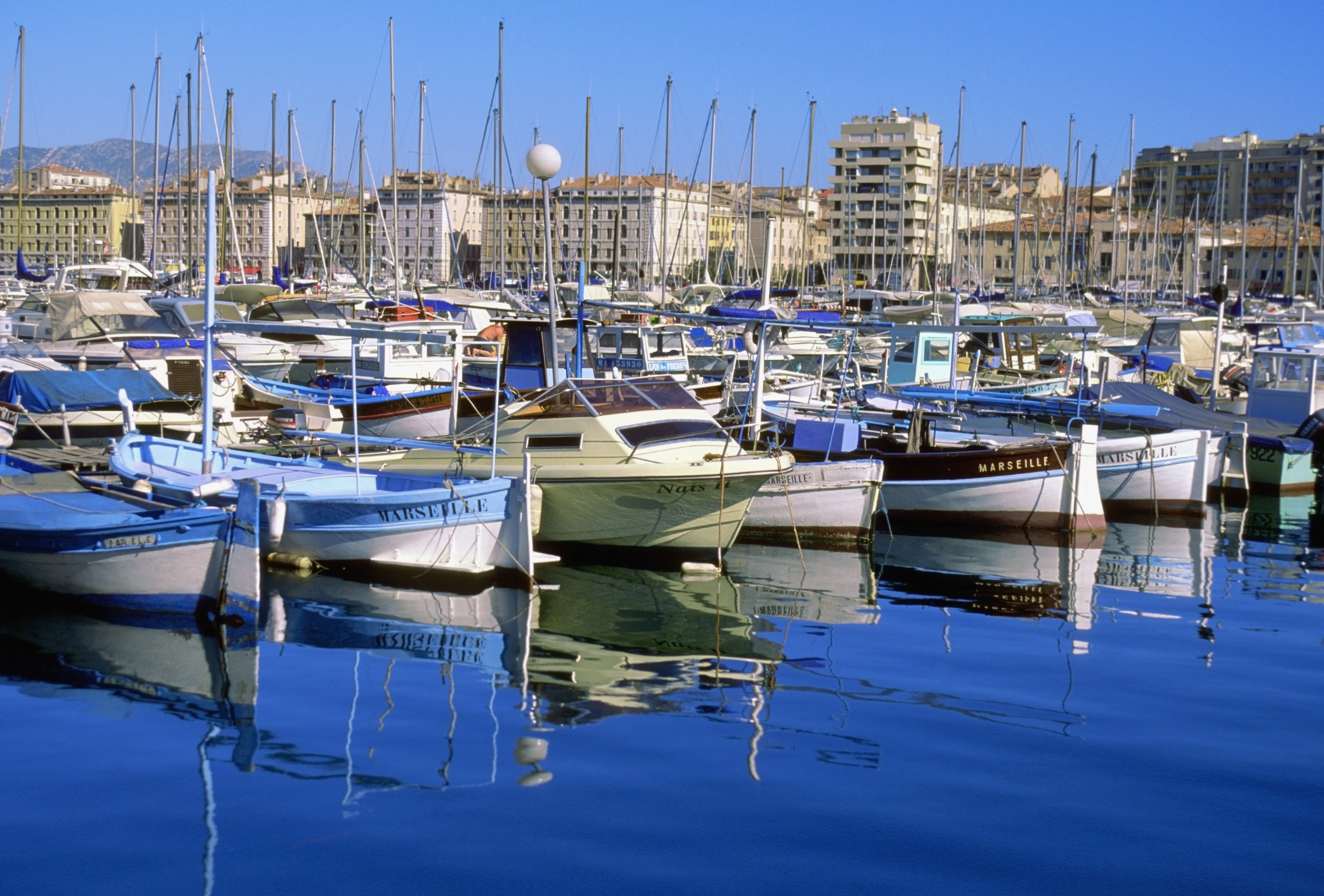 Boats docked at a harbour in the Vieux Port, Marseille