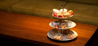 Guests can tuck into afternoon tea in West Courtyard.